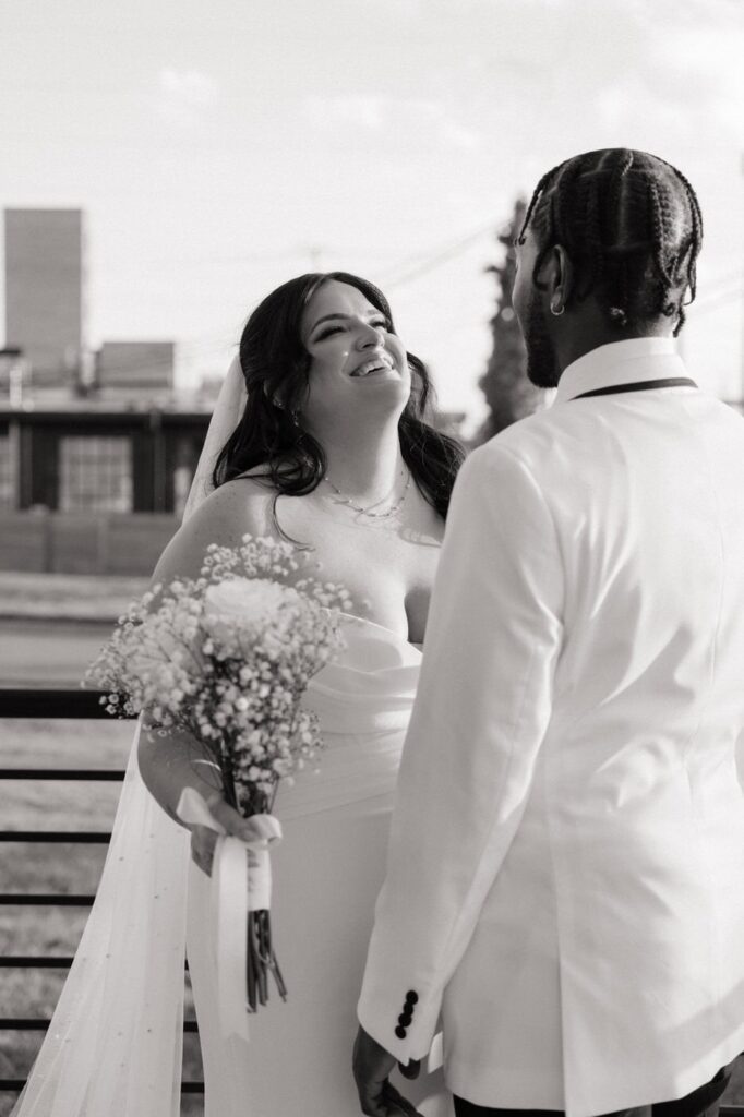Couple laughing during portraits at Nashville Tennessee wedding