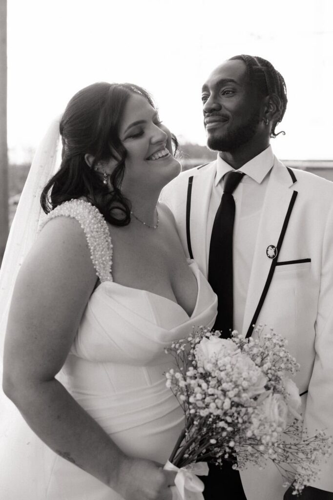 Couple laughing during portraits at Nashville Tennessee wedding