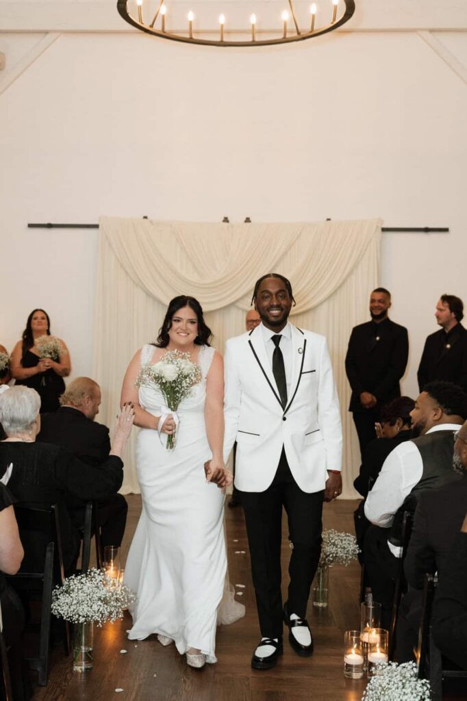 couple walking back down the aisle after wedding in nashville