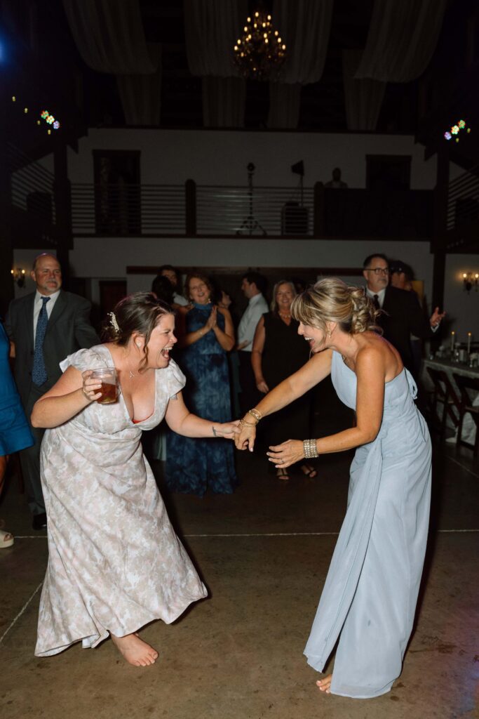 Guests dancing at The Venue at Fiddle Dee Farms wedding reception