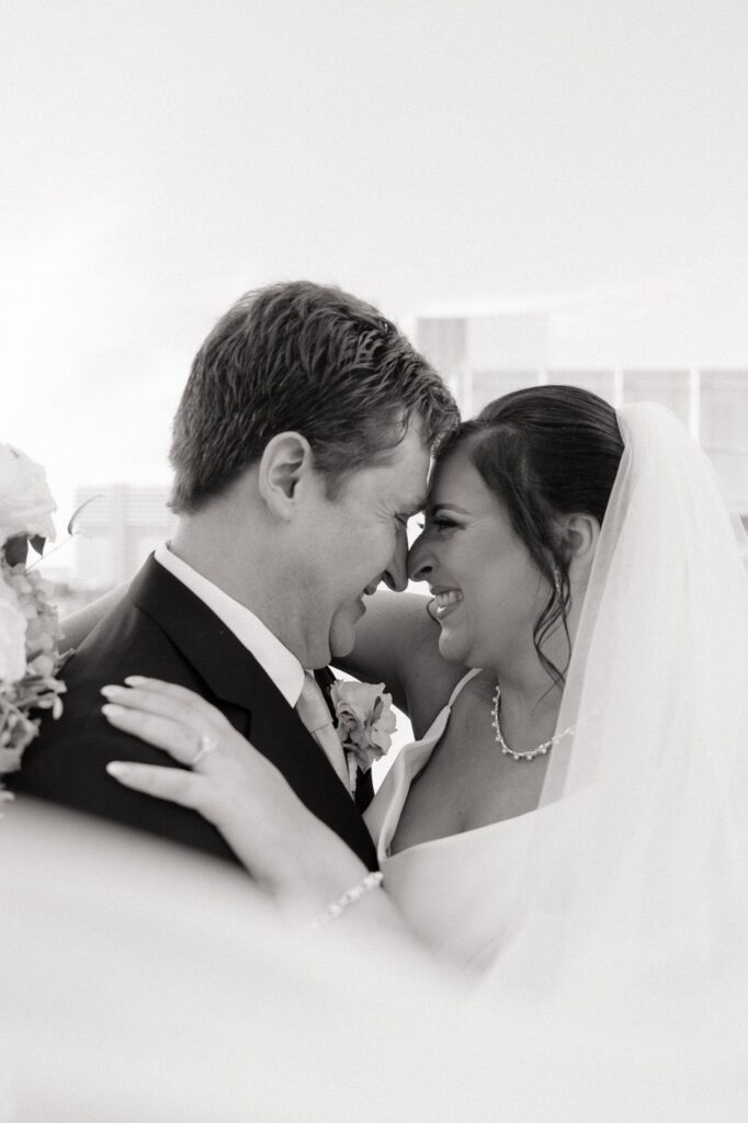 wedding photographer in downtown nashville documents bell tower wedding
