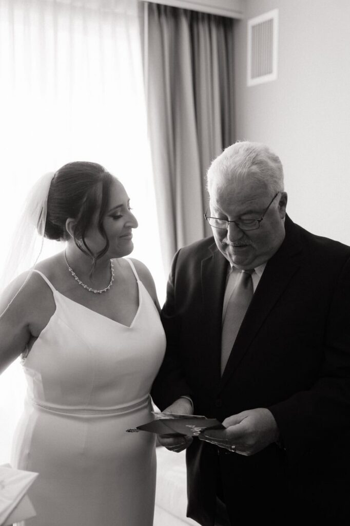 intimate moment between bride and her father on her wedding day