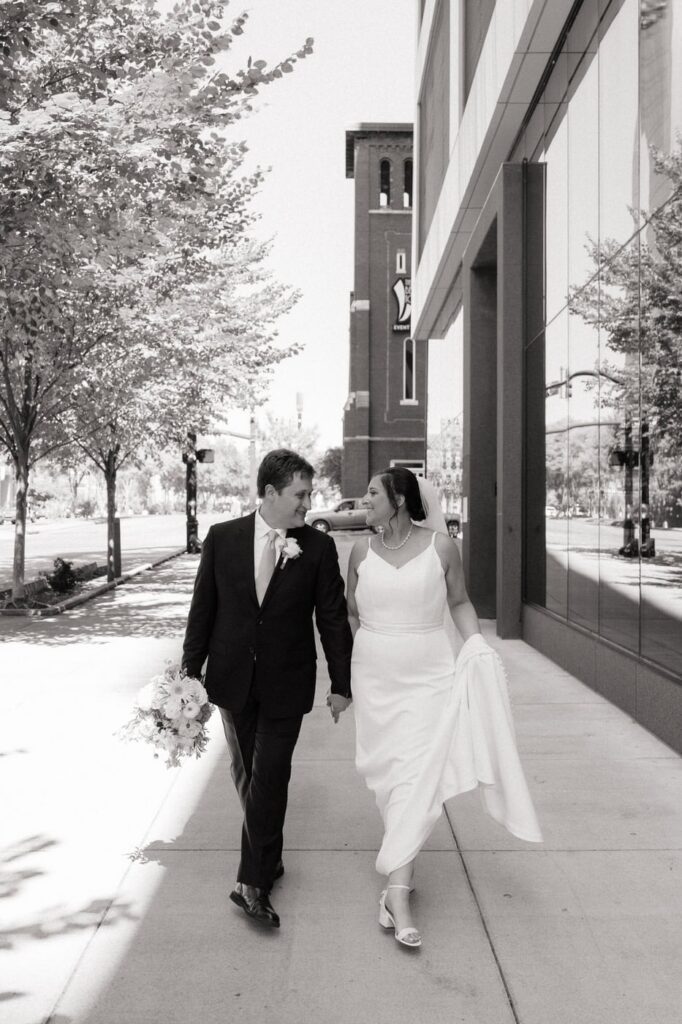 documentary style wedding photography in downtown nashville at the bell tower