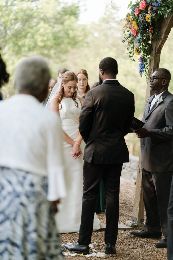 bride and groom saying vows at cedarmont farm