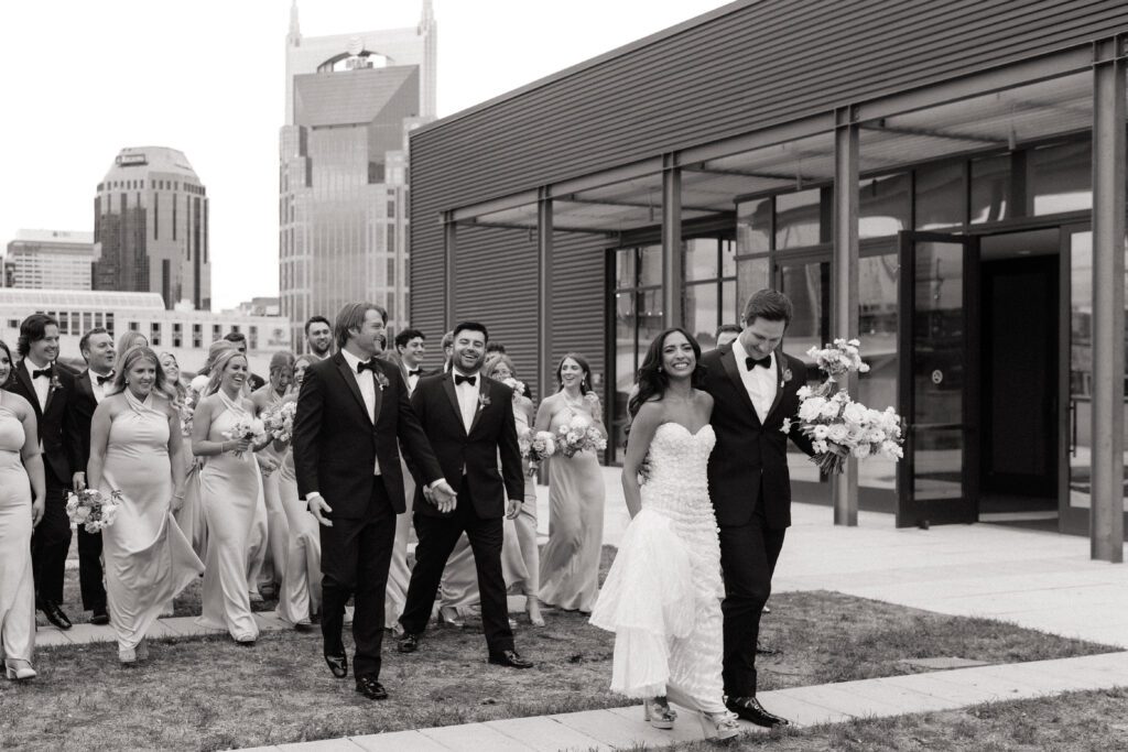 country music hall of fame wedding bridal party laughing candidly