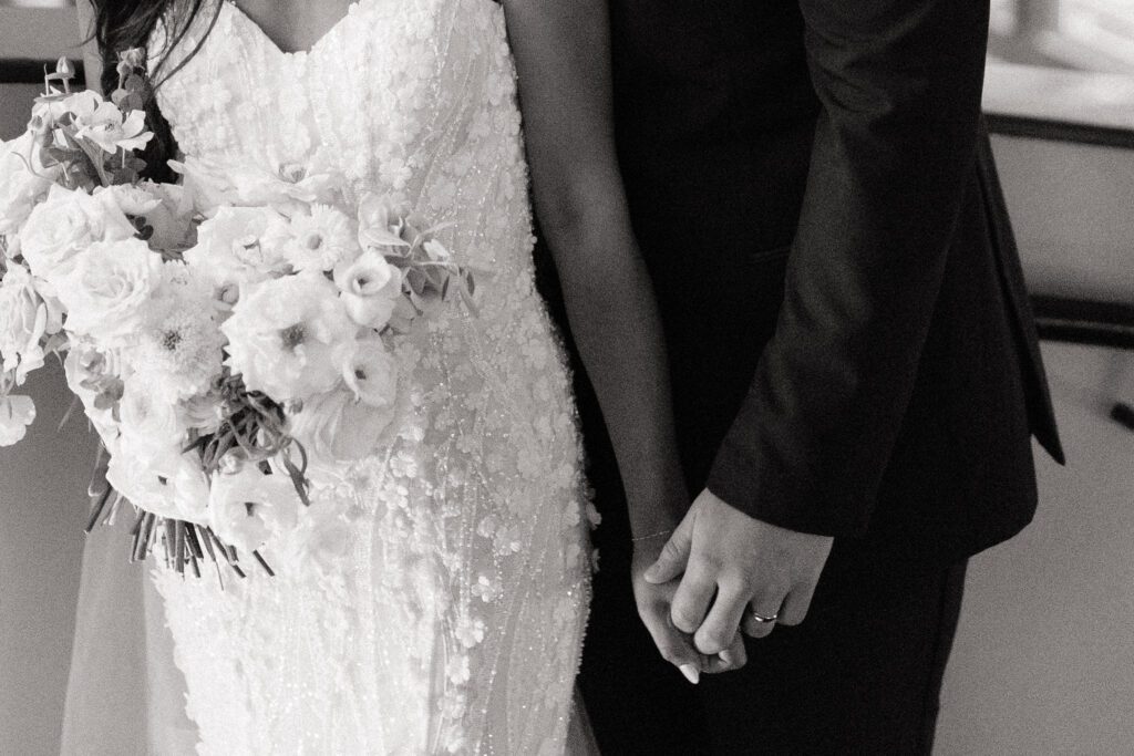 close up of couples hands on their wedding day in nashville