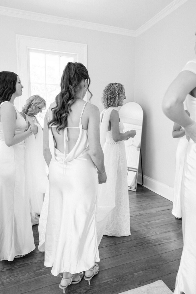 Bride laughing with bridesmaids at Eader House Tennessee