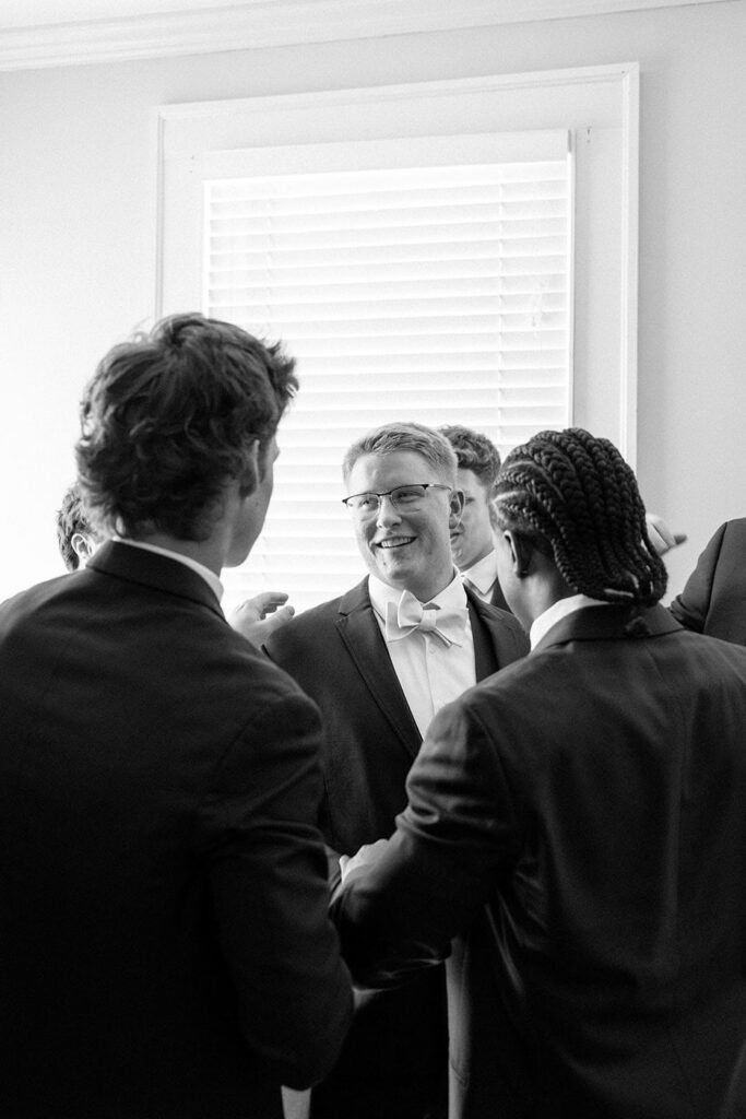 Groomsmen getting ready at Eader House summer wedding Tennessee