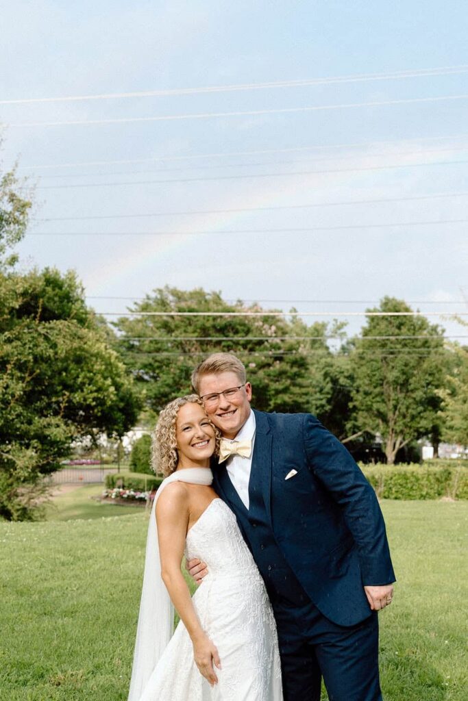 Bride and groom with rainbow at Eader House Tennessee