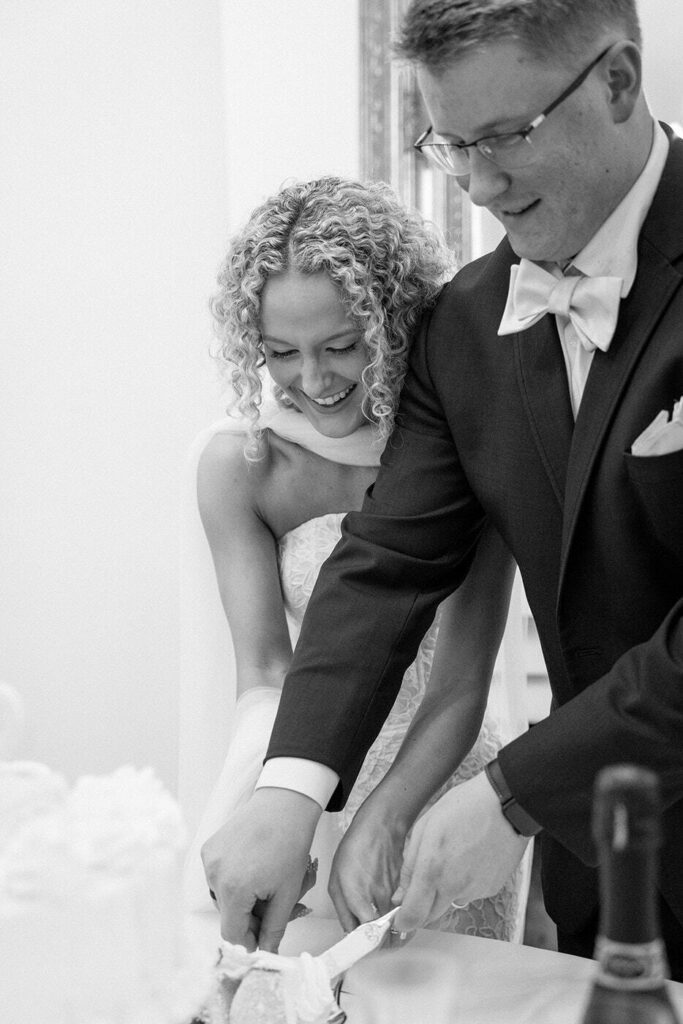 Cake cutting at Eader House summer wedding Tennessee