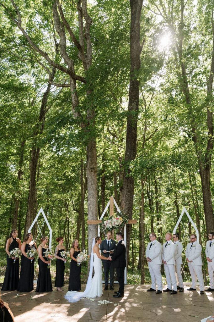Outdoor wooded wedding ceremony at Hickory Meadow Tennessee venue