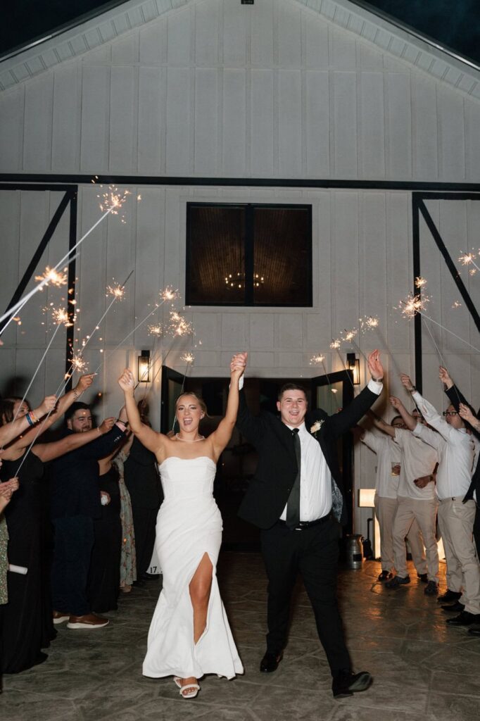 bride and groom sparkler exit at tennessee wedding venue