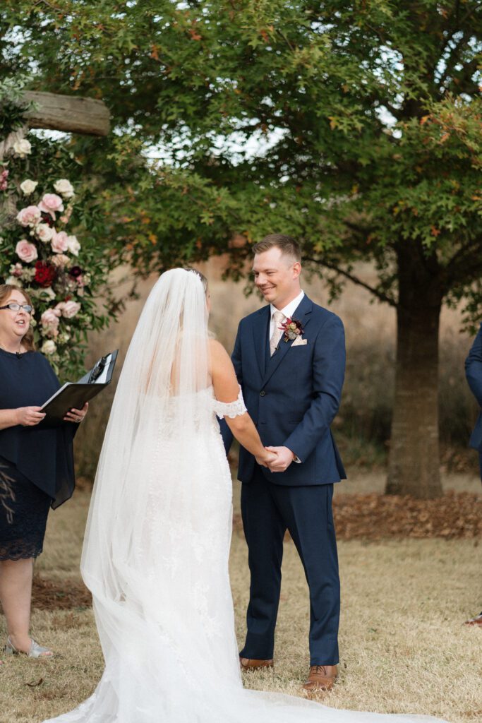 couple saying their vows at wedding ceremony in nashville