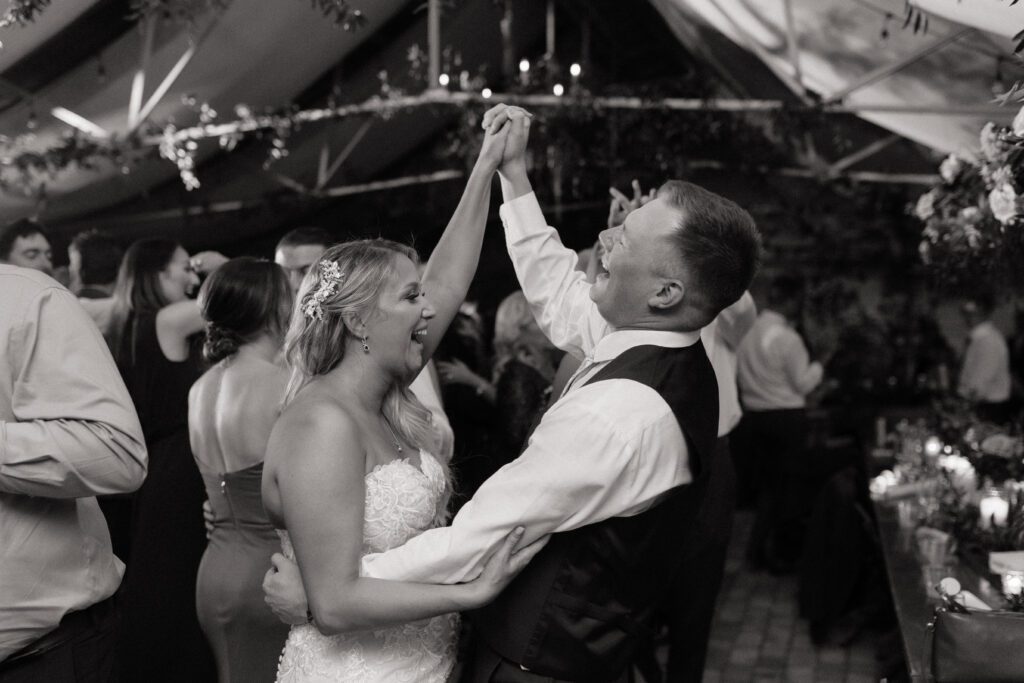 candid moment of couple dancing at their wedding reception in nashville