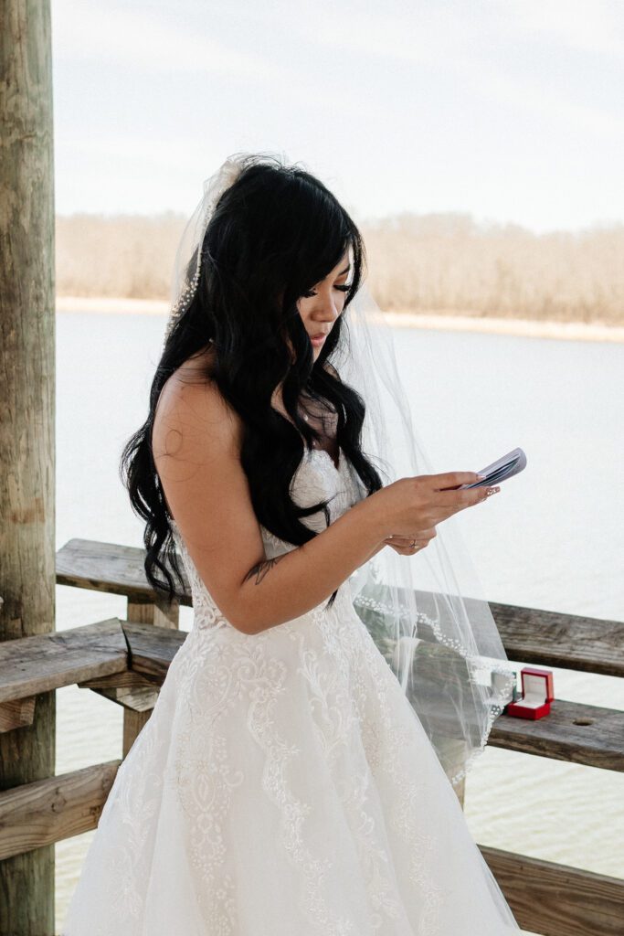 bride reading vows at elopement at long hunter state park