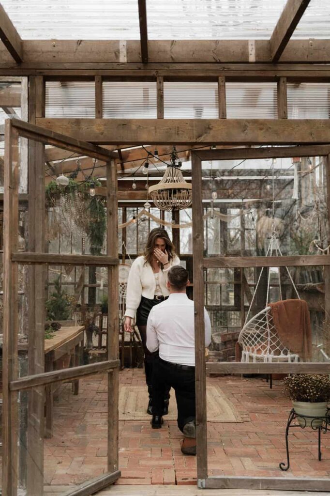 Proposal moment at Flora Haus greenhouse Nashville Tennessee