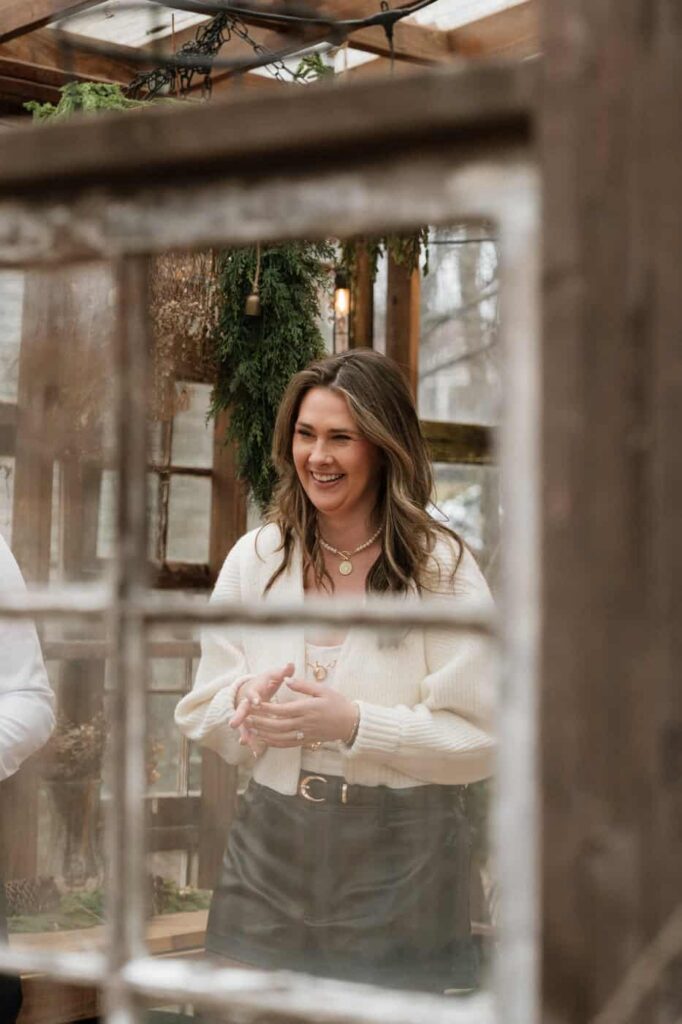 candid moment of girl laughing at engagement session in nashville