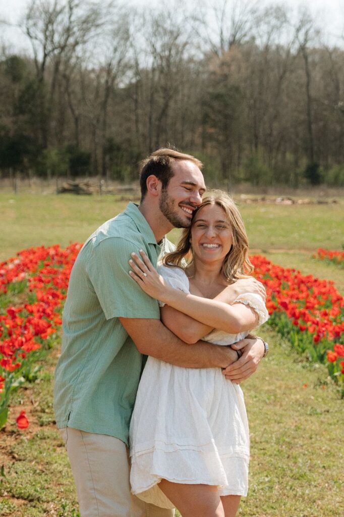 candid moment of couple laughing during engagement session in nashville