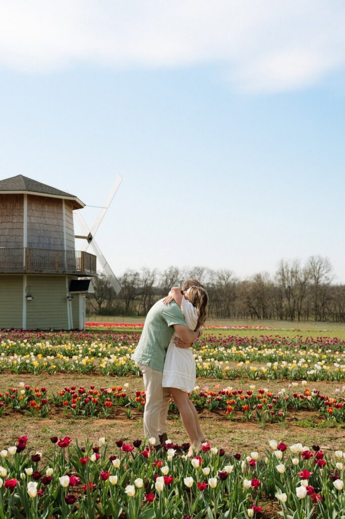 couple hugging after getting engaged in nashville tennessee