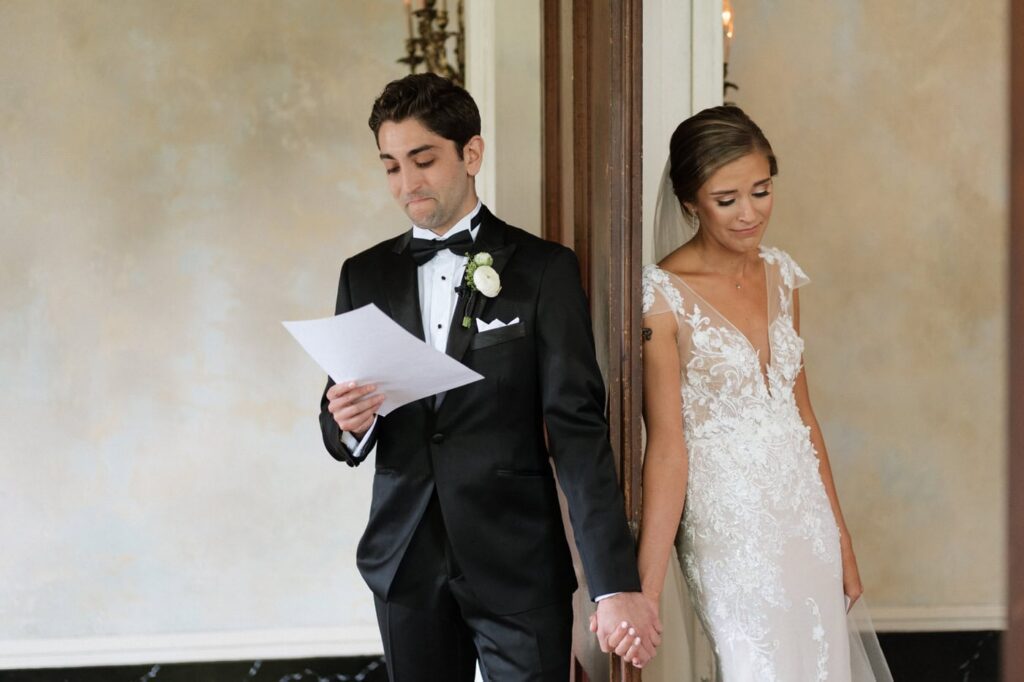 couple reading their vows at riverwood in nashville