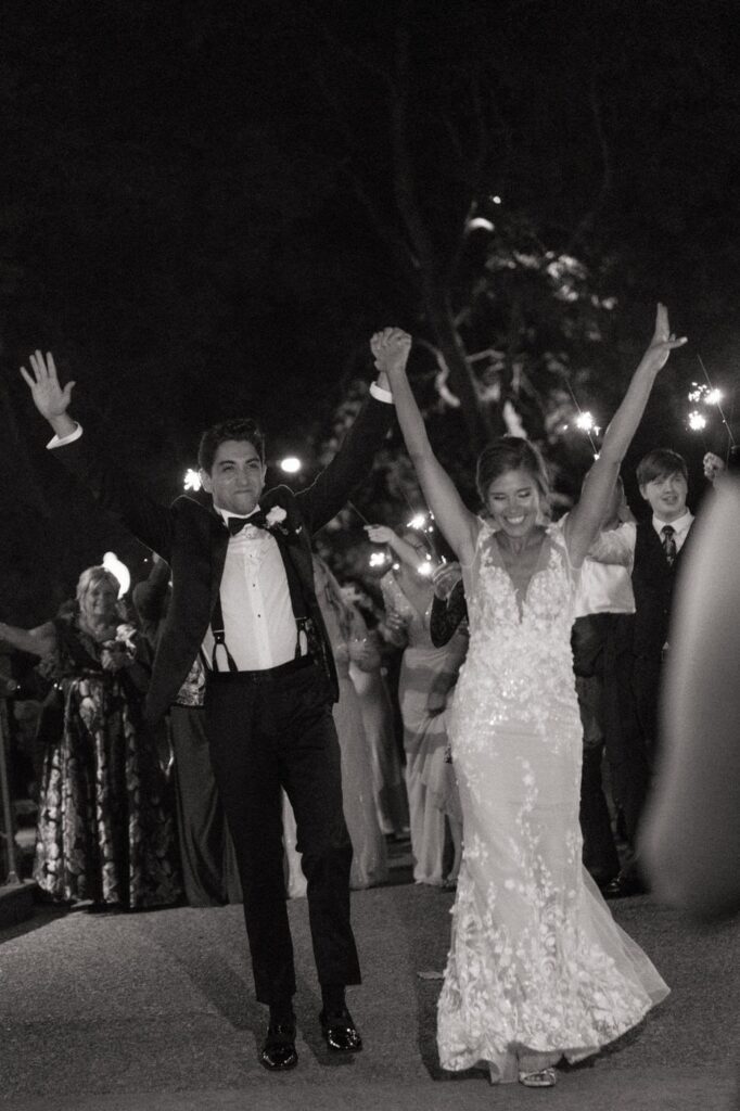 couples grand exit with sparklers on their wedding night