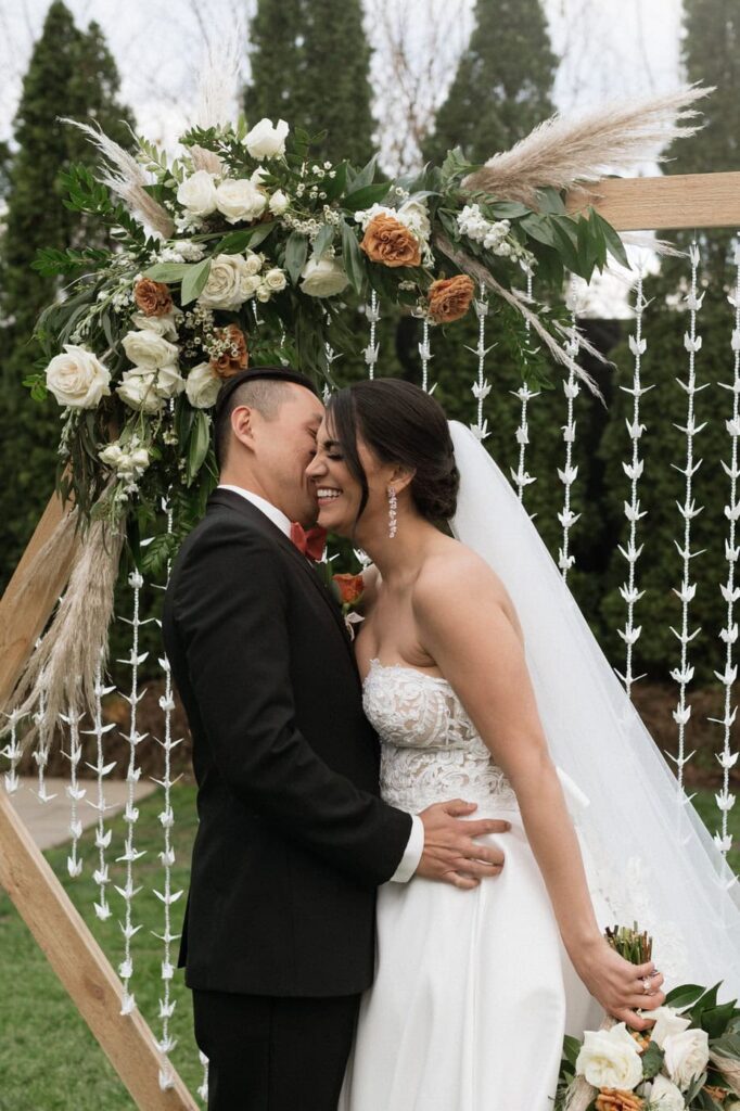 nashville wedding photographer documents candid moment of couple on their wedding day at the cordelle