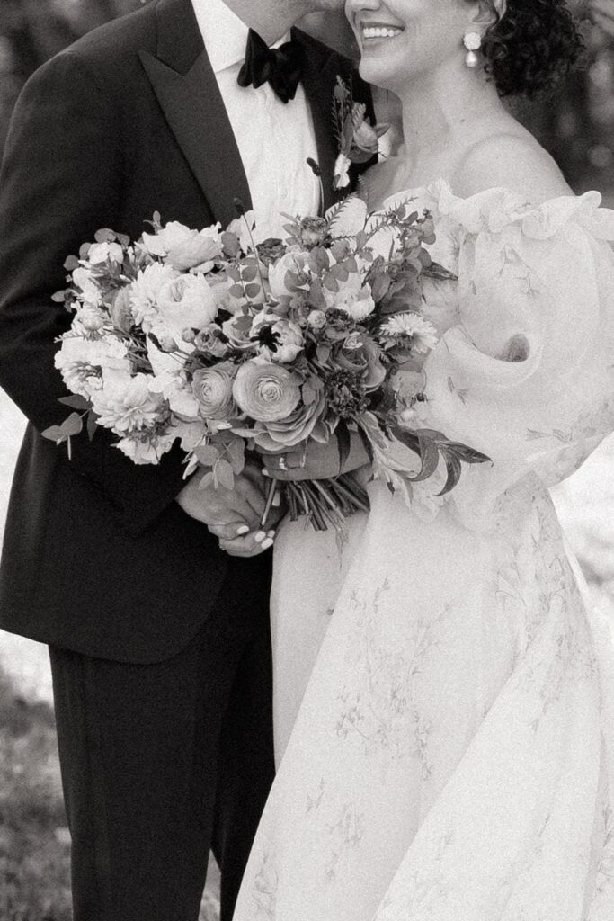 couple embracing on their wedding day at trinity view farm