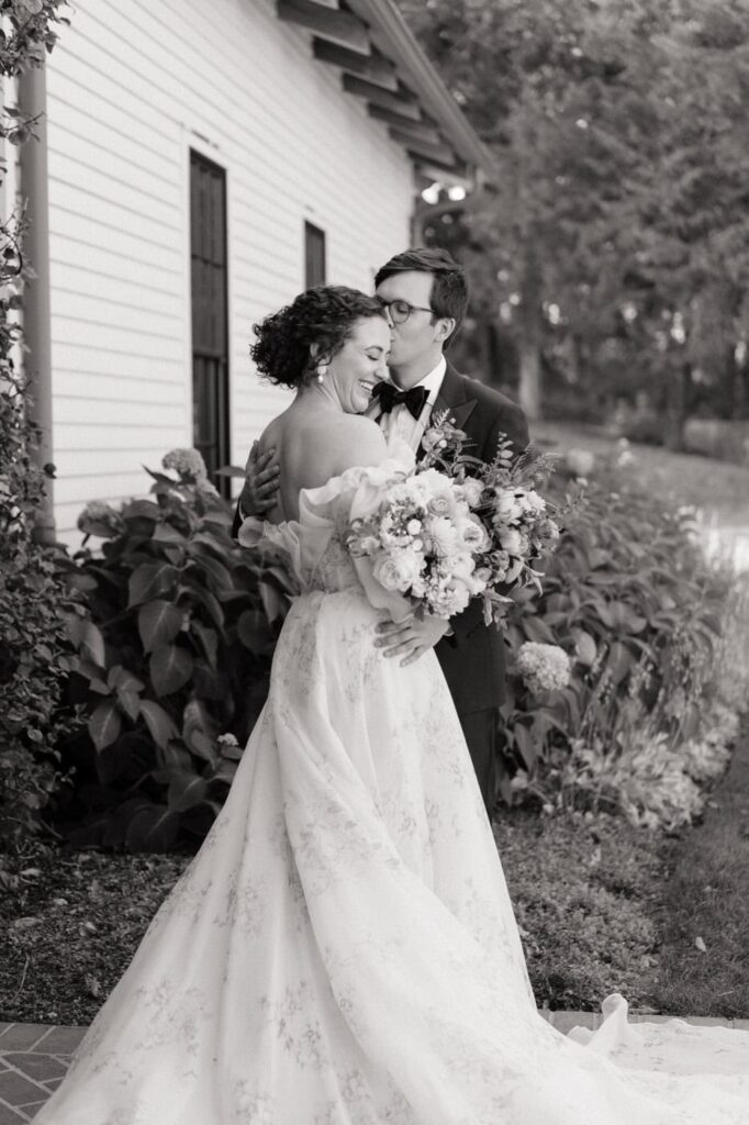 groom kissing bride's cheek on their wedding day in tennessee