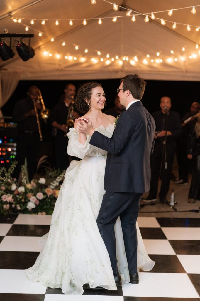 bride and groom first dance at their wedding reception in nashville