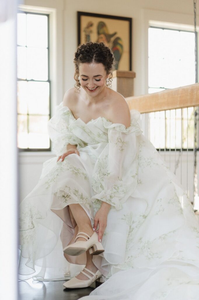 bride smiling while getting ready at trinity view farm in nashville tennessee