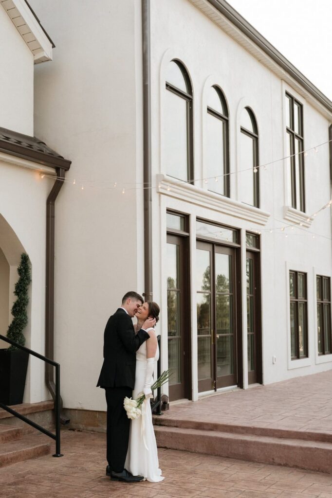 couple sharing a sweet moment during golden hour portraits at tennessee wedding venue