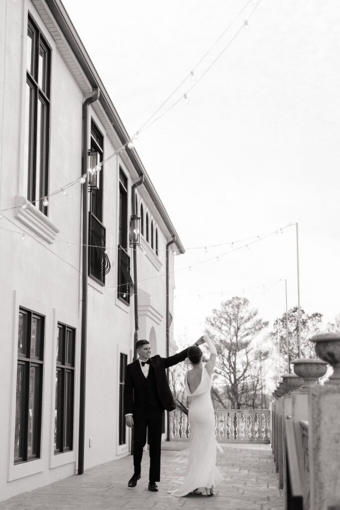 couple laughing and dancing outside the dimora in tennessee