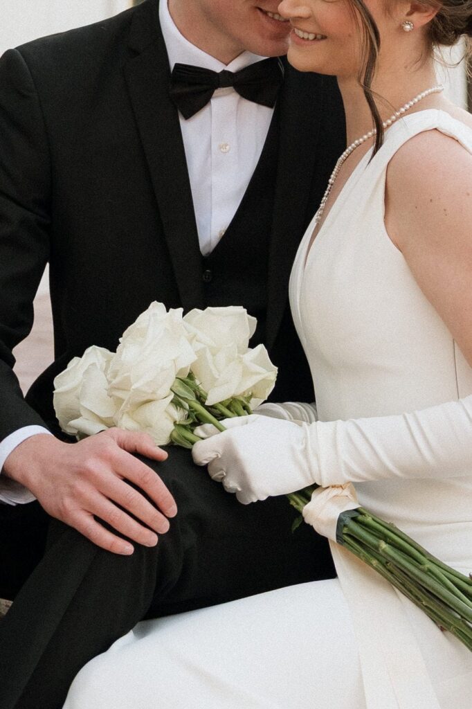 Couple on balcony at The Dimora wedding venue