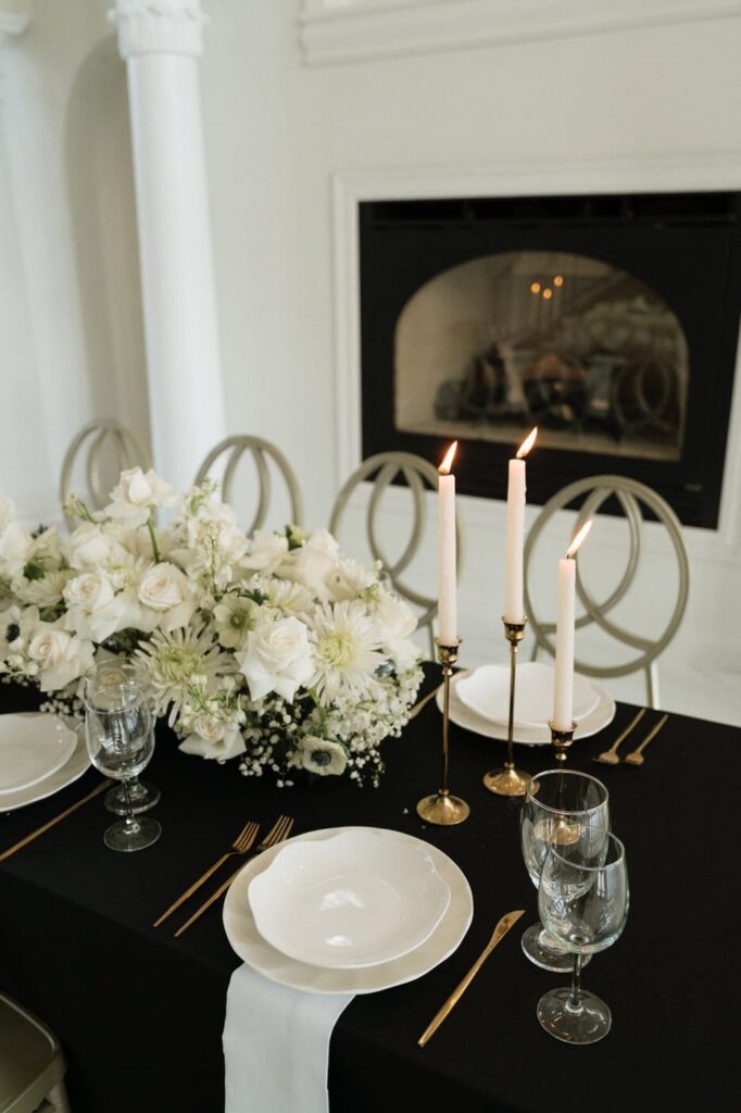 Taper candles and white roses at The Dimora wedding Tennessee