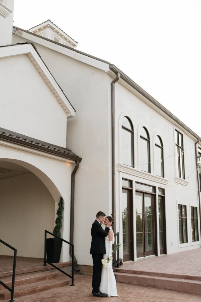 Wide shot couple portraits at The Dimora wedding venue Tennessee