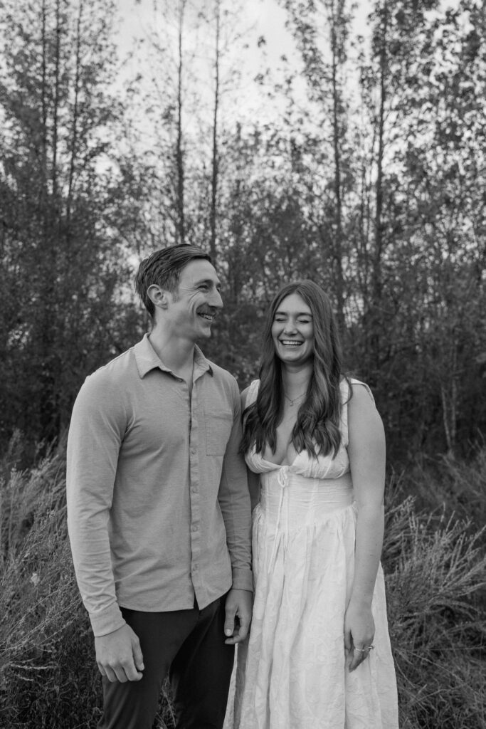 couple laughing during their nashville engagement photos