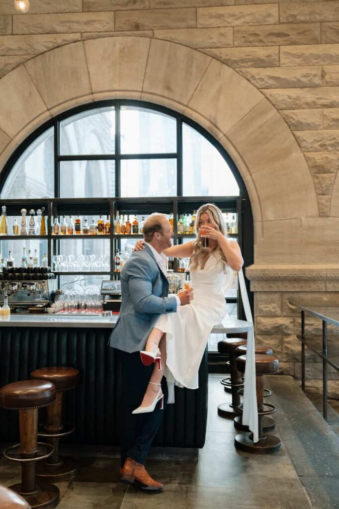 couple standing at the bar at union station in downtown nashville