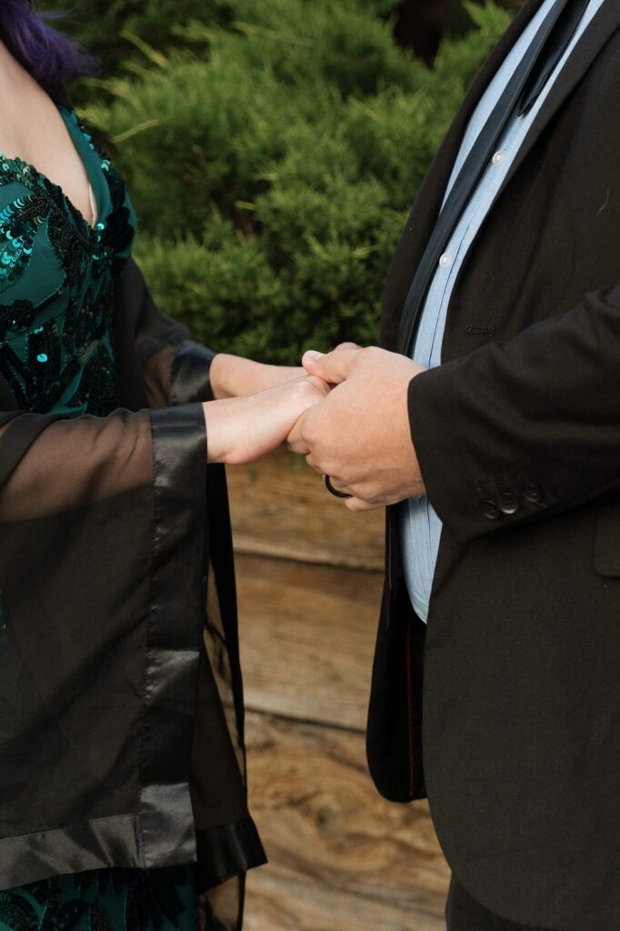 close up of couple holding hands during nashville engaement photos