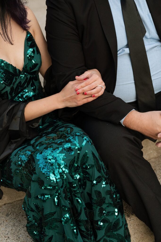 couple sitting on the steps during engagement session in nashville
