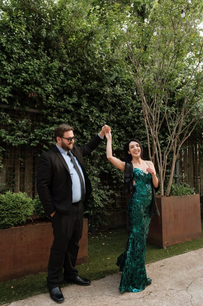 couple dancing and laughing during engagement session in nashville