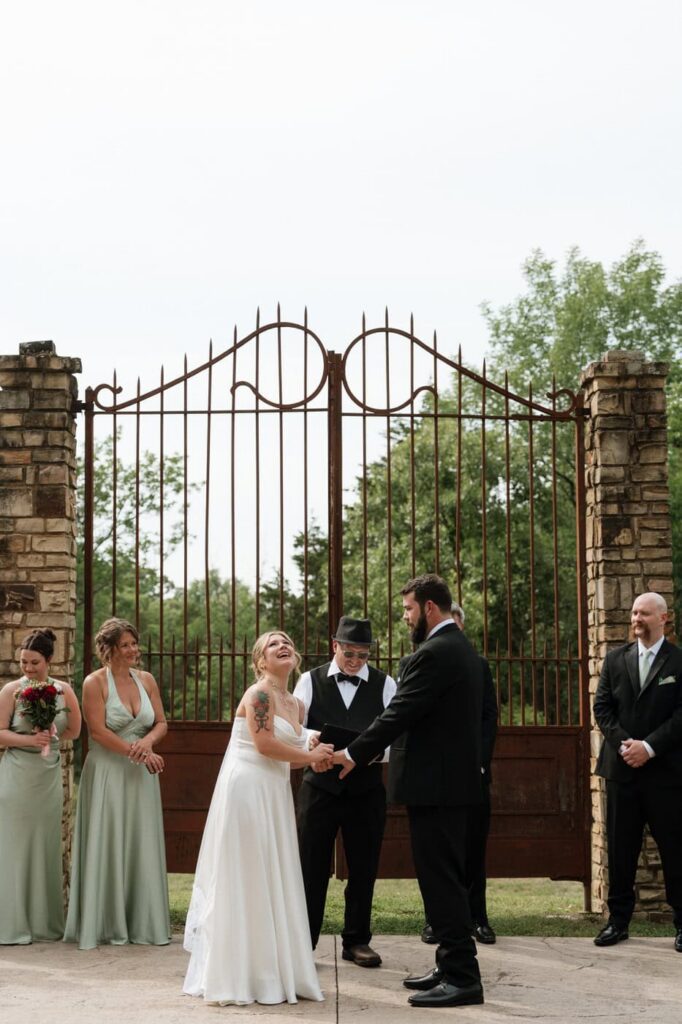 bride laughing during wedding ceremony in nashville