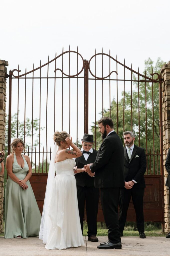 bride getting emotional during vows at nashville wedding ceremony