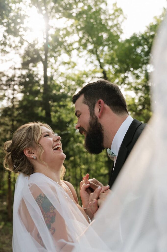 candid moment between bride and groom at nashville wedding