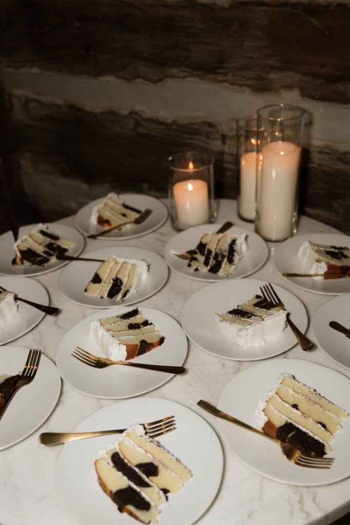 wedding cake sliced and ready for guests at the estelle reception