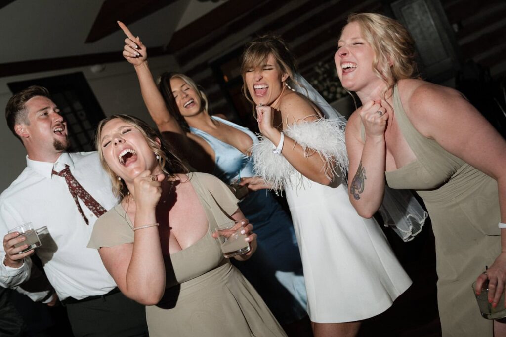 bride and her friends singing at estelle nashville wedding reception
