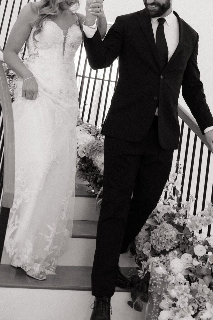 couple walking down the stairs at the monroe on 415th in tennessee