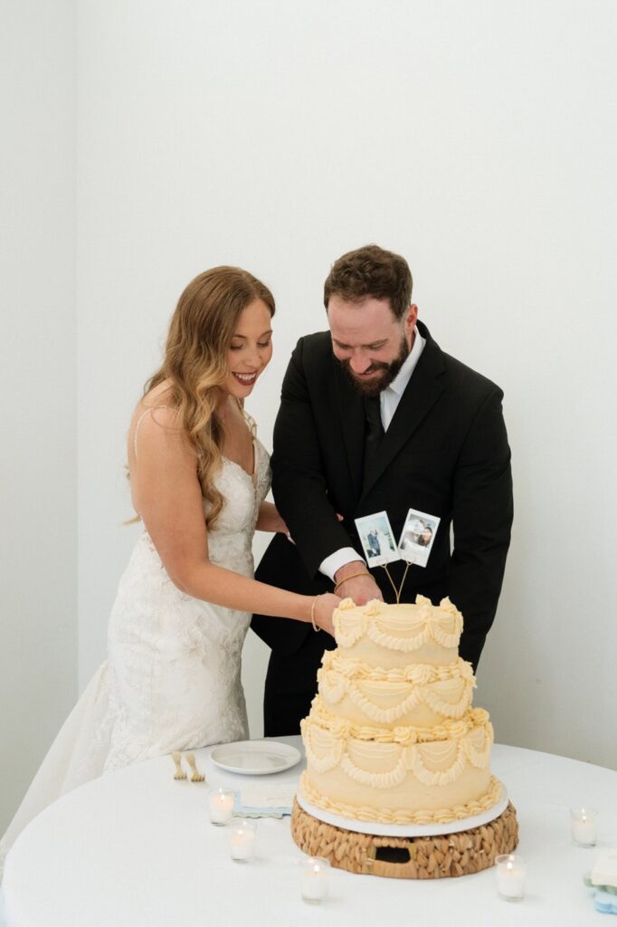 couple cutting their wedding cake