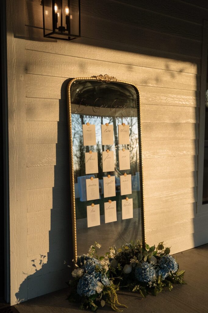 guests seating chart sitting outside in the sunset