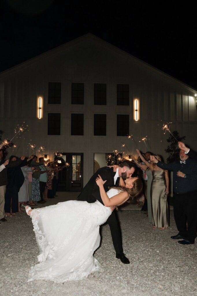 sparkler exit couple kissing at the monroe on 415th wedding