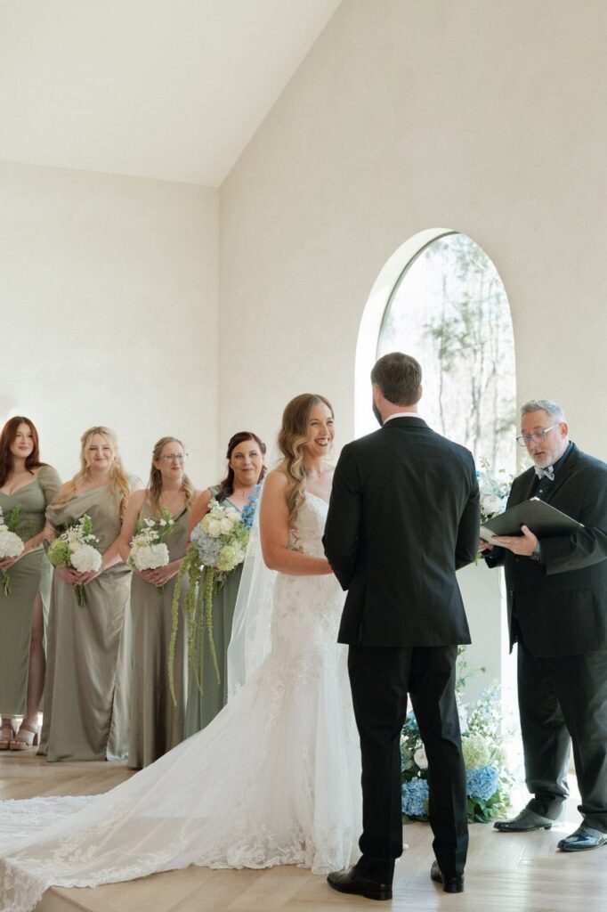 couple smiling and saying their vows at spring wedding in nashville